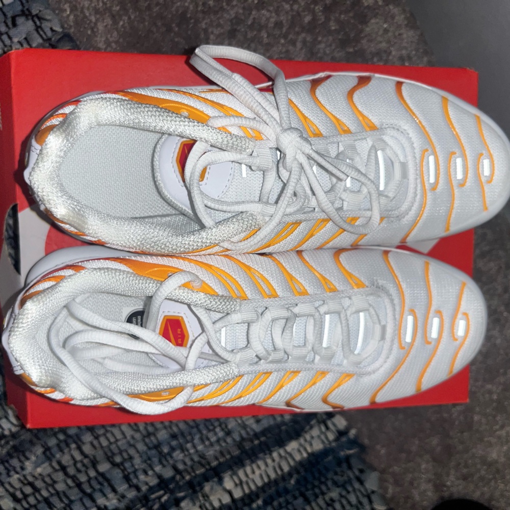 Nike Air Max Plus EMEA red, white, and orange